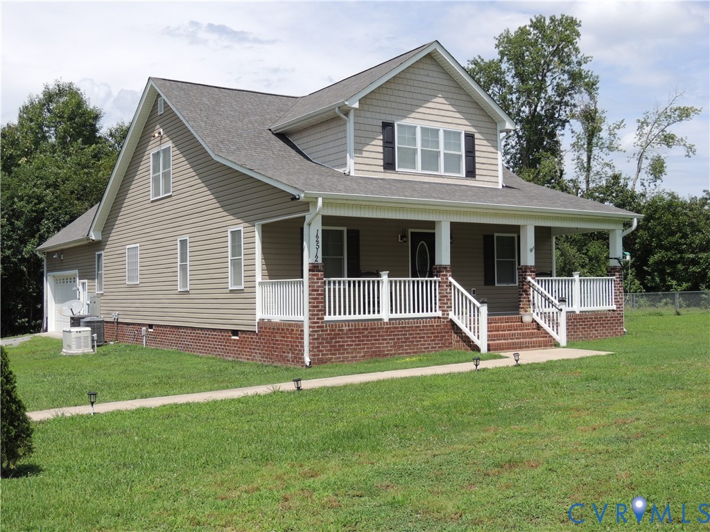12512 Cox Road Church Road, VA 23833 - Photo 1 of 42 Two-story residence featuring light beige siding a