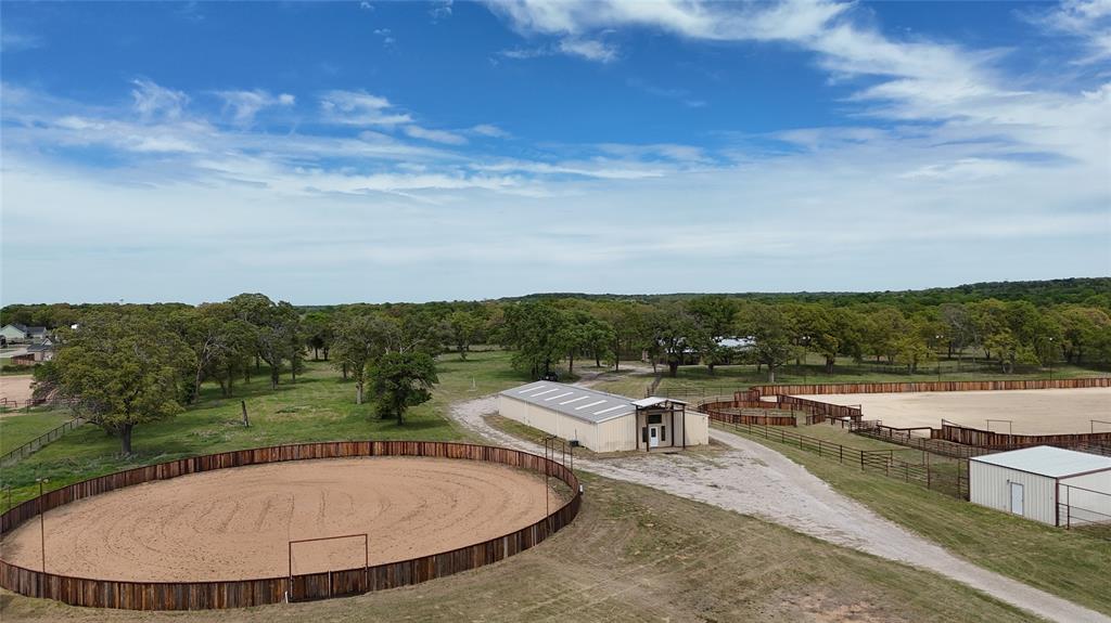 990 Doss Road Millsap, TX 76066 - Photo 2 of 39 an aerial view of a house with a yard basket ball court and outdoor seating