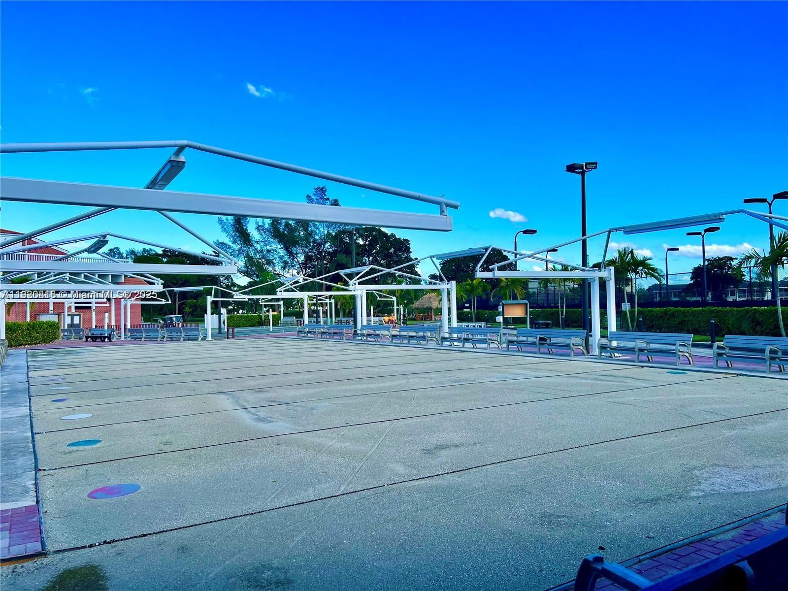 253 Prescott M, Unit 253 Deerfield Beach, FL 33442 - Photo 36 of 53 a view of a building with a porch