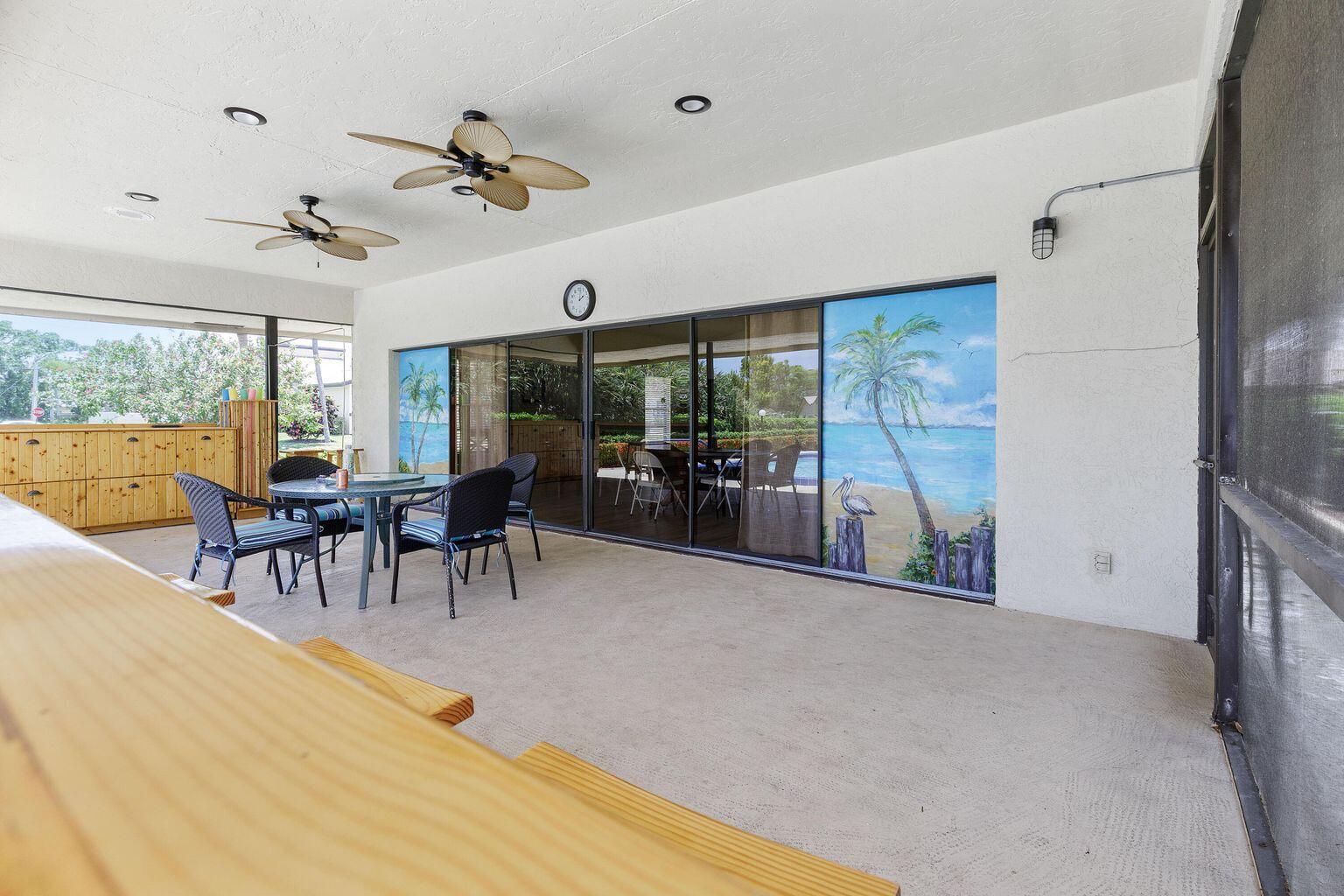 11 Ridge Pointe Drive, Unit D Boynton Beach, FL 33435 - Photo 25 of 26 Club house patio