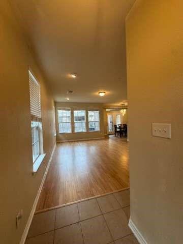 5820 Stone Mountain Road The Colony, TX 75056 - Photo 4 of 27 a view of an empty room with a window