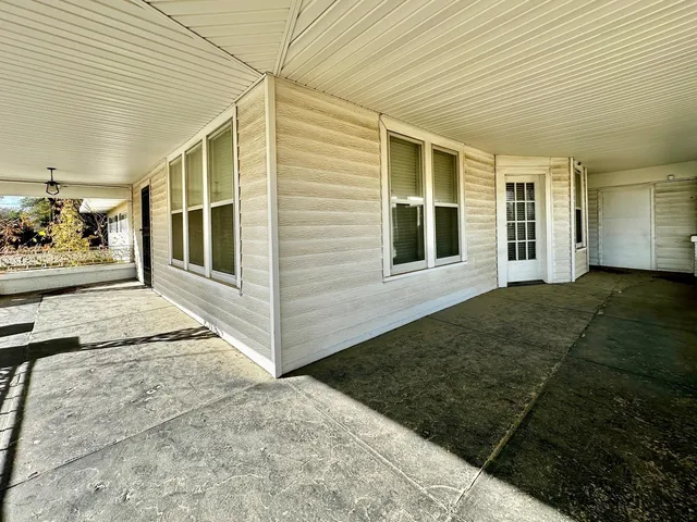 a view of livingroom with furniture and a fireplace