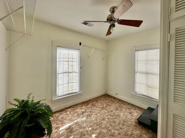 a view of an empty room and window