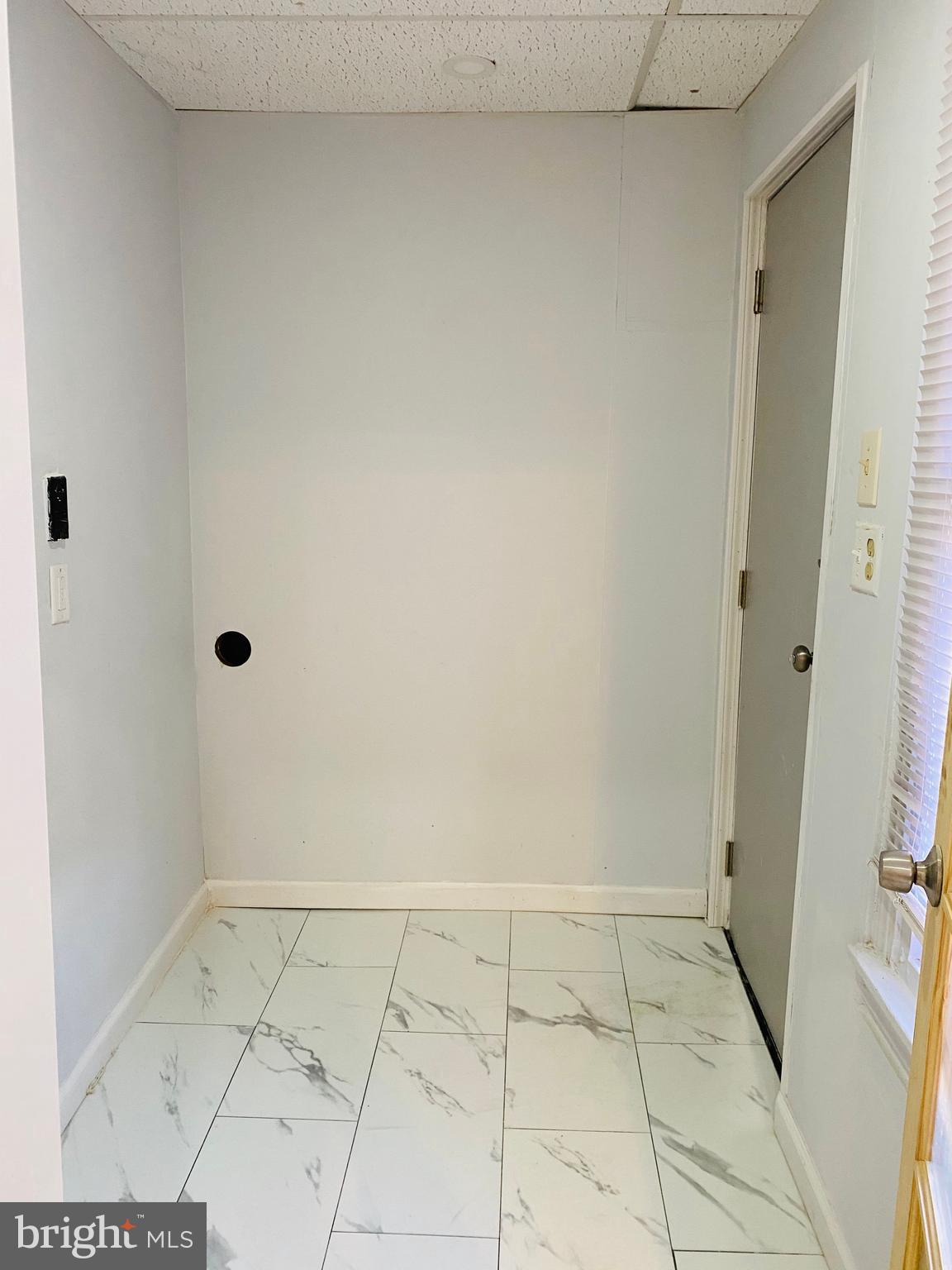 239 Exeter Street Reading, PA 19601 - Photo 5 of 14 1st floor Laundry Hook up off the kitchen.