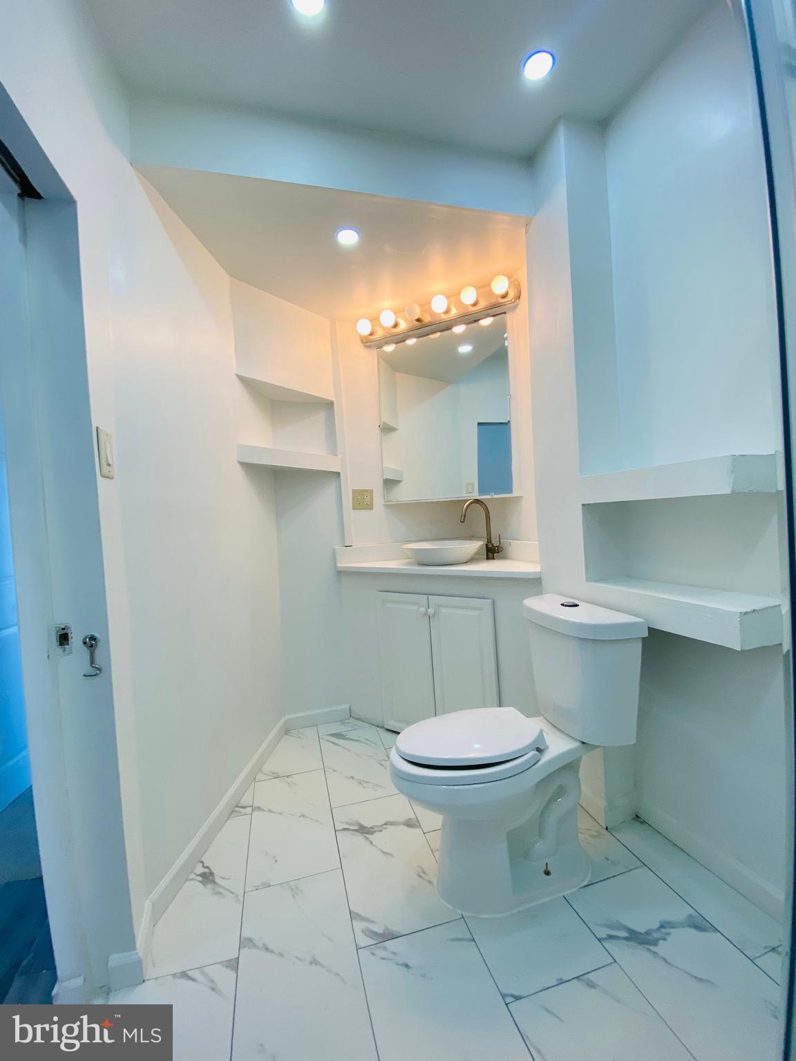 239 Exeter Street Reading, PA 19601 - Photo 10 of 14 bathroom