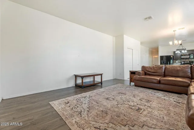 a living room with furniture and a couch