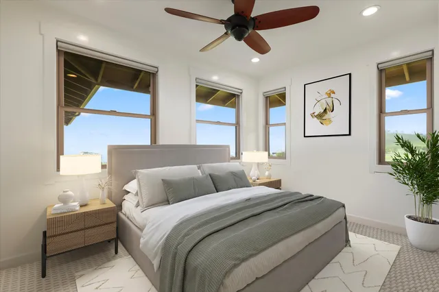 a bedroom with a bed and a painting on the wall