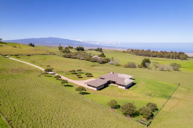 a view of an ocean and city