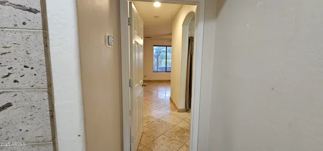 view of a bathroom from a corridor