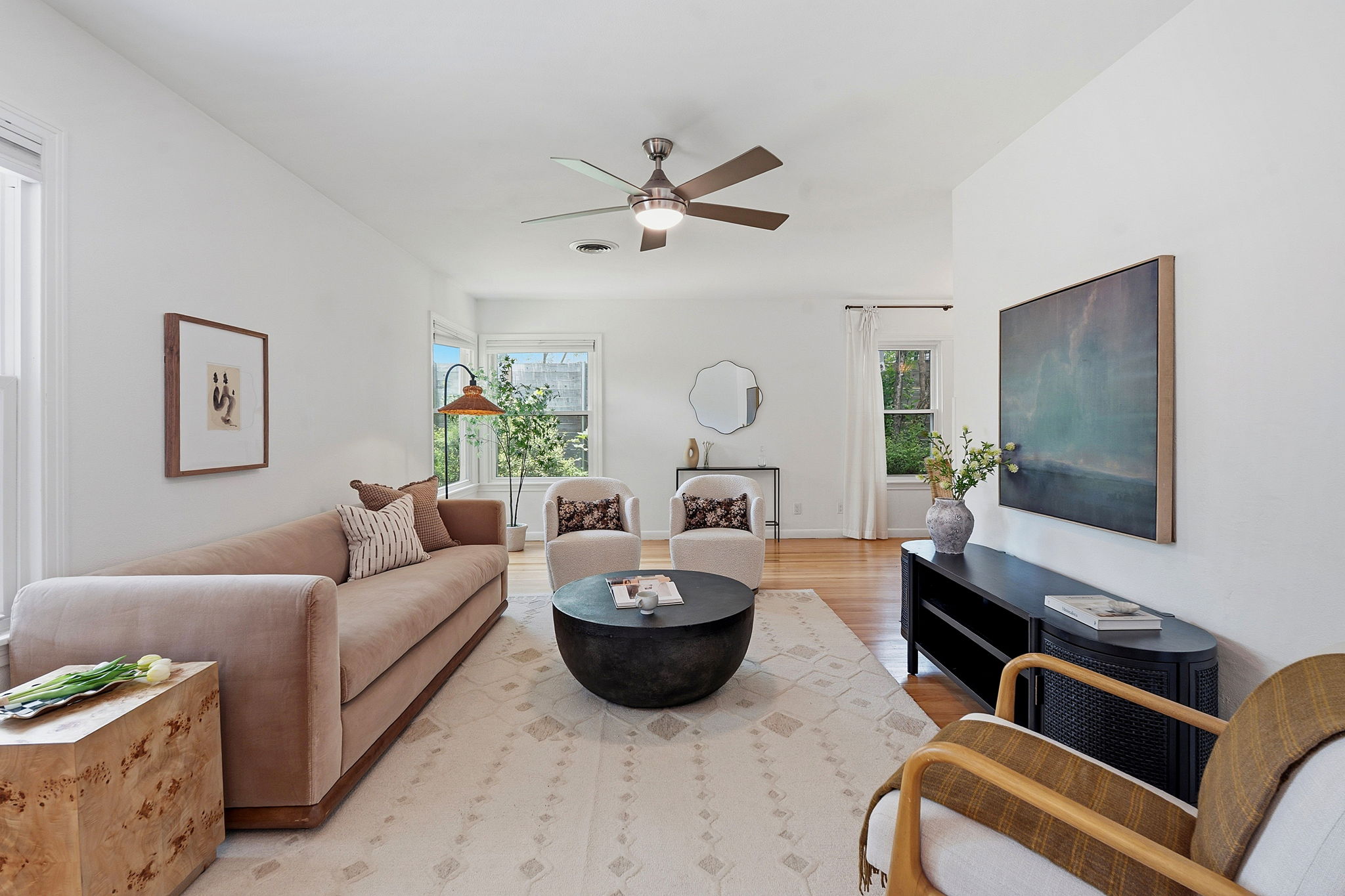 900 Stark Street Austin, TX 78756 - Photo 1 of 25 A well-lit gathering space offers hardwood flooring and ample natural light.