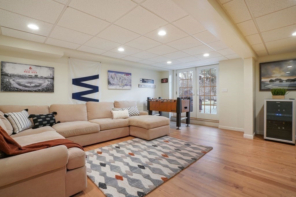 19 Vine Brook Road Lexington, MA 02421 - Photo 16 of 19 a living room with furniture and a wooden floor