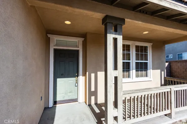 a view of a porch with a window