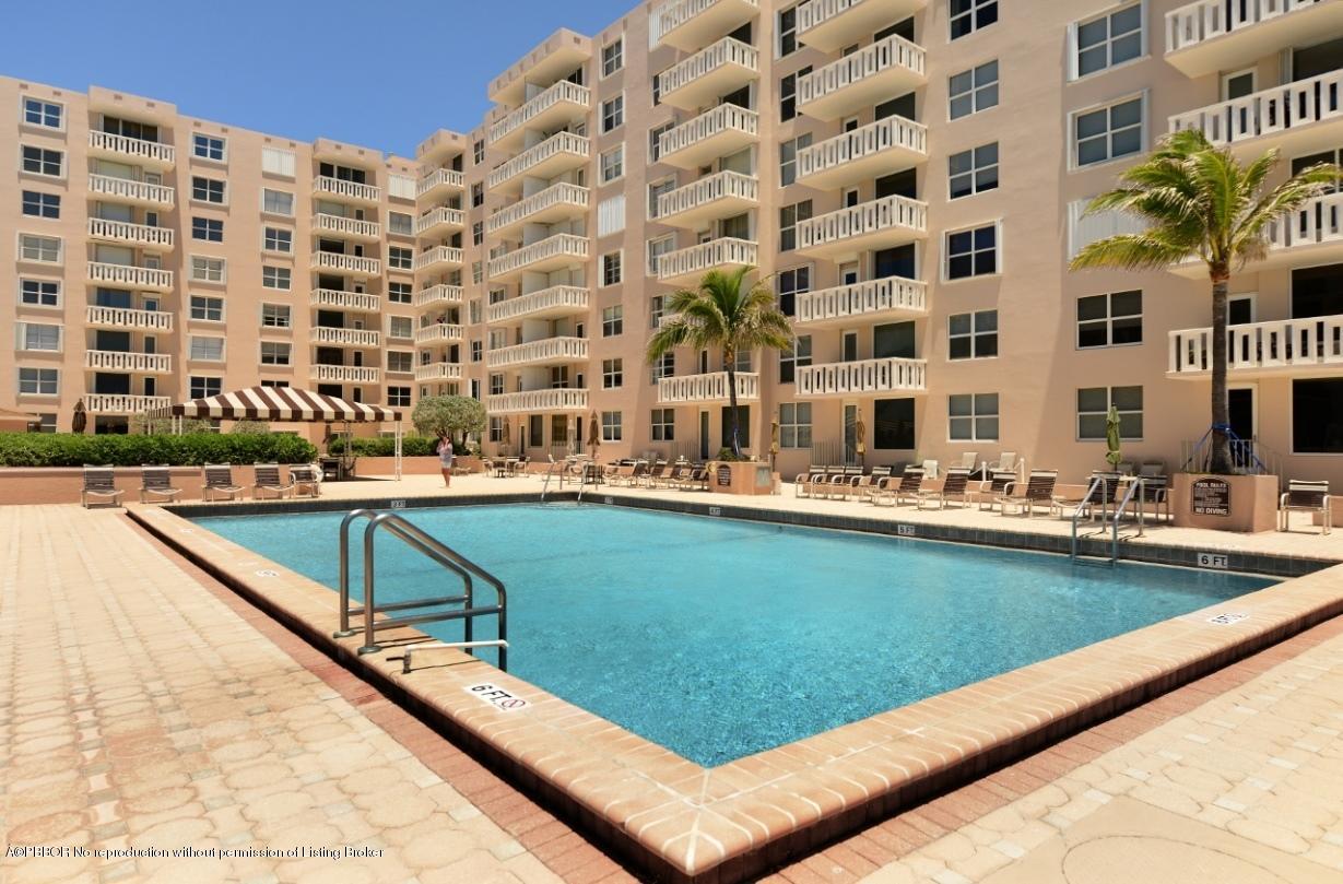 3450 South Ocean Boulevard, Unit 410 Palm Beach, FL 33480 - Photo 14 of 21 a view of swimming pool with outdoor seating