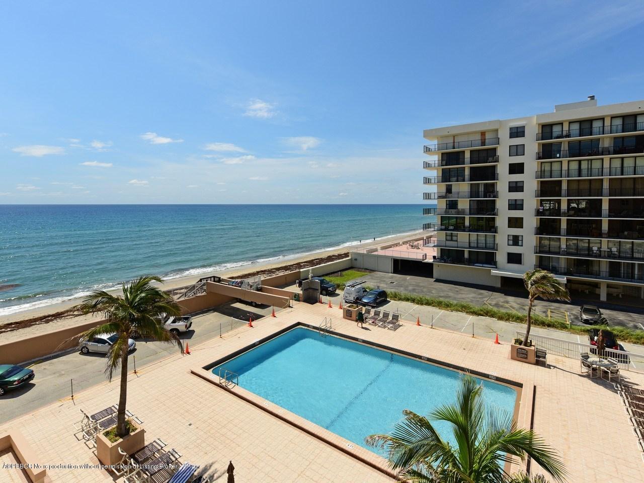 3450 South Ocean Boulevard, Unit 410 Palm Beach, FL 33480 - Photo 3 of 21 a view of a balcony with chairs and potted plants