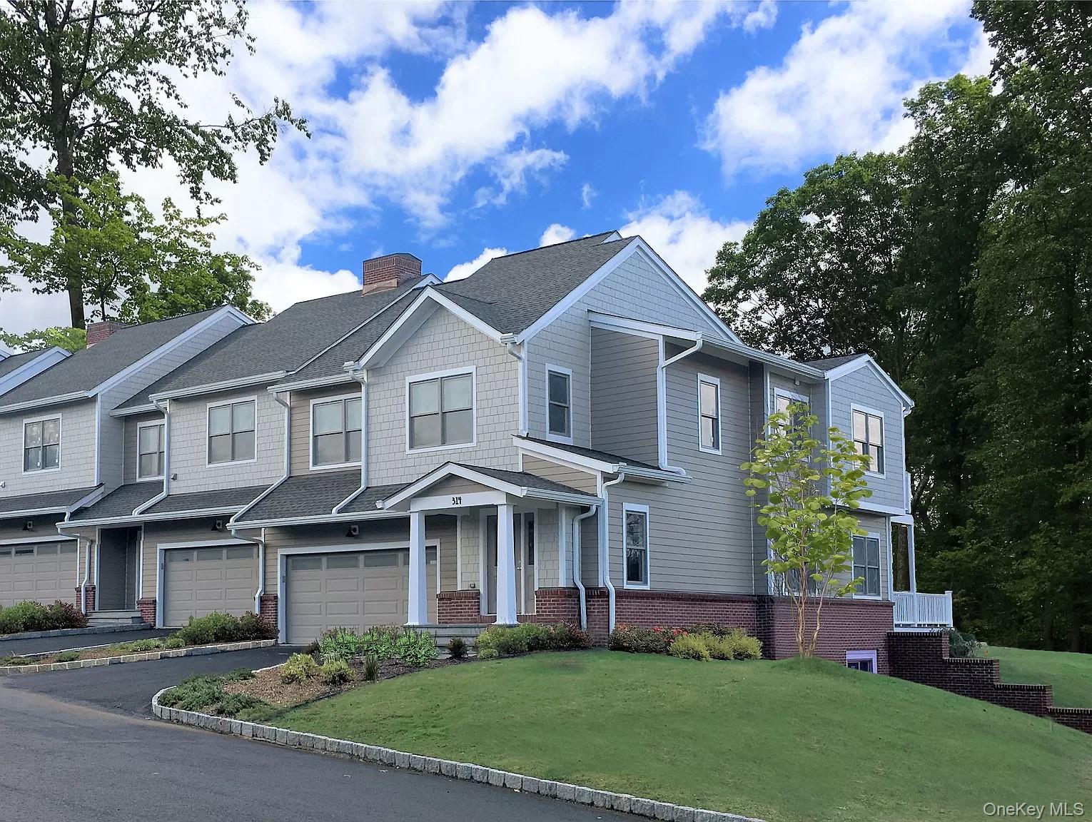 314 Boulder Ridge Road South Salem, NY 10590 - Photo 20 of 26 a front view of a house with a garden