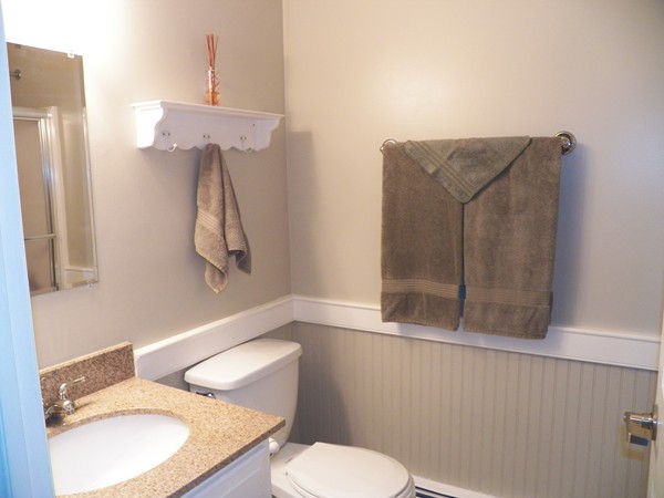 54 Juniper Road Ashburnham, MA 01430 - Photo 11 of 26 a bathroom with a toilet sink and mirror