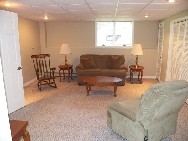 54 Juniper Road Ashburnham, MA 01430 - Photo 16 of 26 a living room with furniture and a window