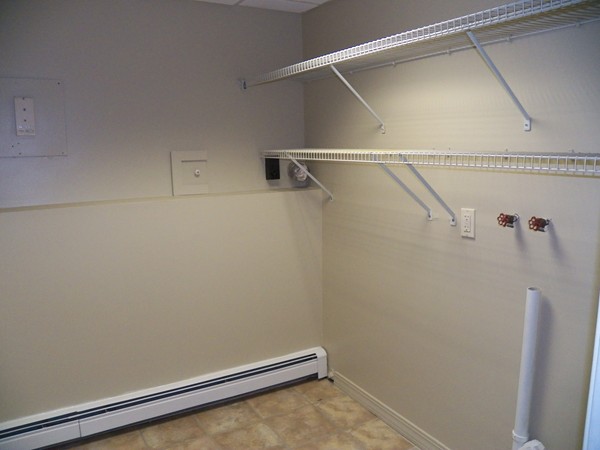 54 Juniper Road Ashburnham, MA 01430 - Photo 18 of 26 a view of a room with racks on the wall