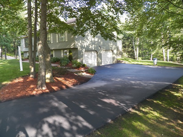 54 Juniper Road Ashburnham, MA 01430 - Photo 2 of 26 a view of a street with a tree