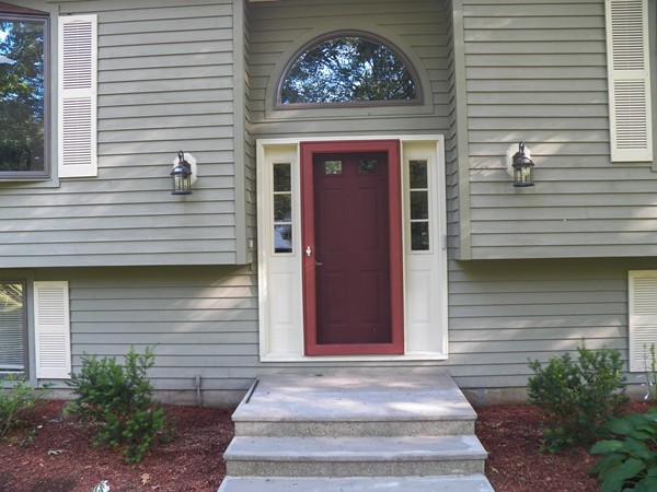 54 Juniper Road Ashburnham, MA 01430 - Photo 6 of 26 a front view of a house with entryway