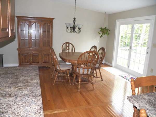 54 Juniper Road Ashburnham, MA 01430 - Photo 9 of 26 a view of a dining room with furniture window and wooden floor