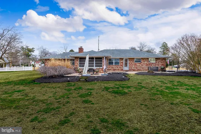 a view of a house with a big yard
