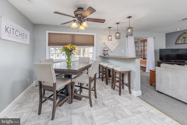 a view of a dining room with furniture
