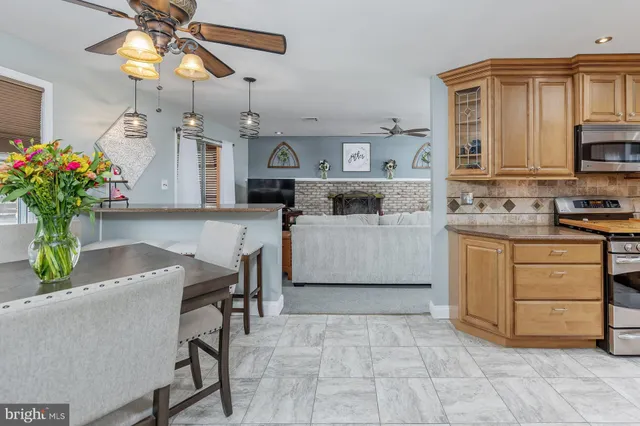 a kitchen with a cabinets counter top space appliances and cabinets