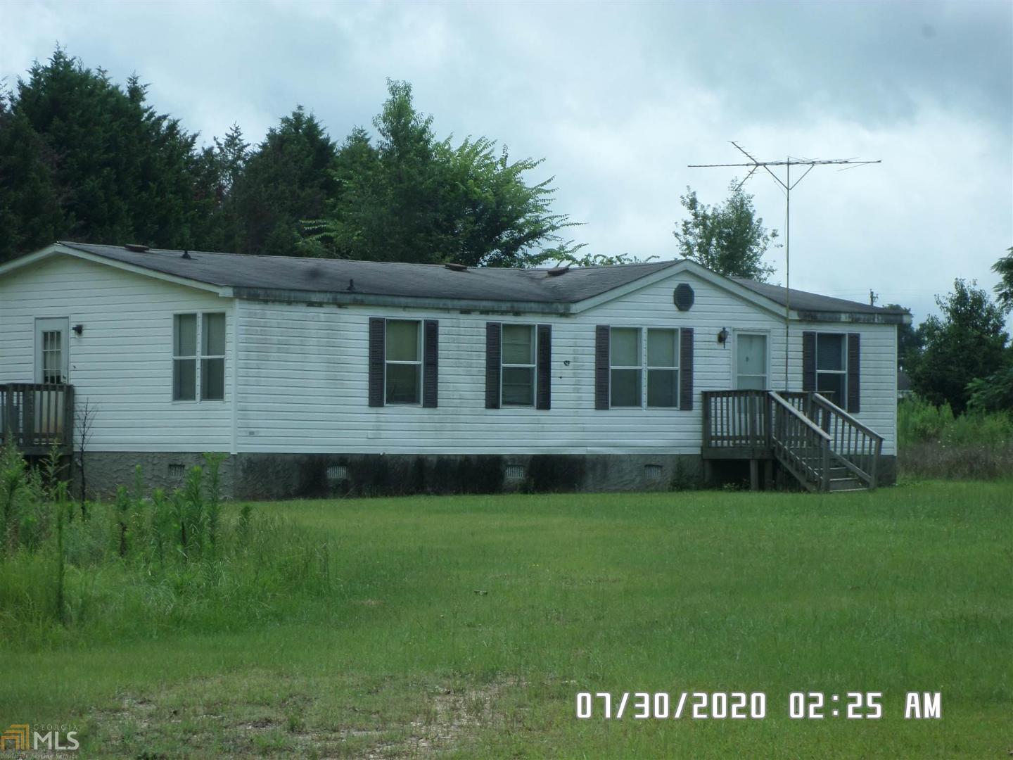 342 Big 6 Farms Road Fort Valley, GA 31030 - Photo 1 of 1 a view of house with a yard