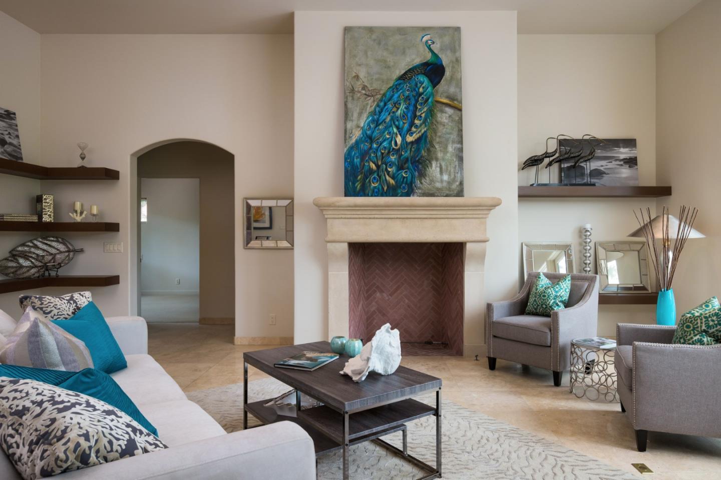 1048 Rodeo Road Pebble Beach, CA 93953 - Photo 5 of 16 a living room with furniture and a fireplace