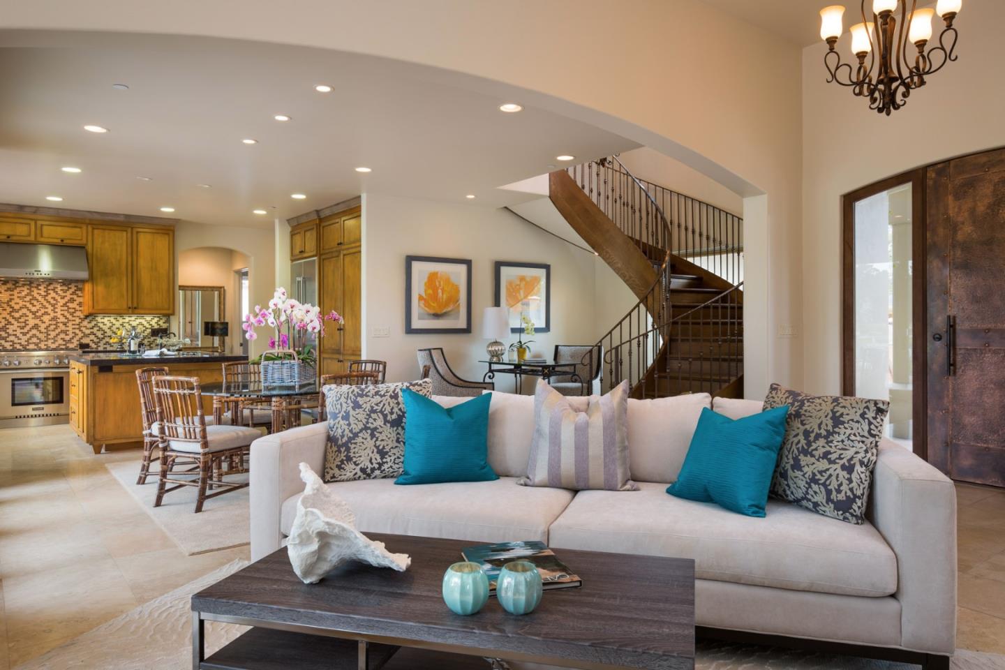 1048 Rodeo Road Pebble Beach, CA 93953 - Photo 6 of 16 a living room with furniture kitchen view and a chandelier