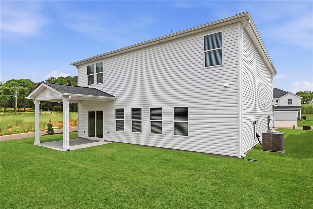 102 Gibbon Way Gray Court, SC 29645 - Photo 22 of 49 This newly constructed residence offers a covered patio ideal for outdoor enjoyment.
