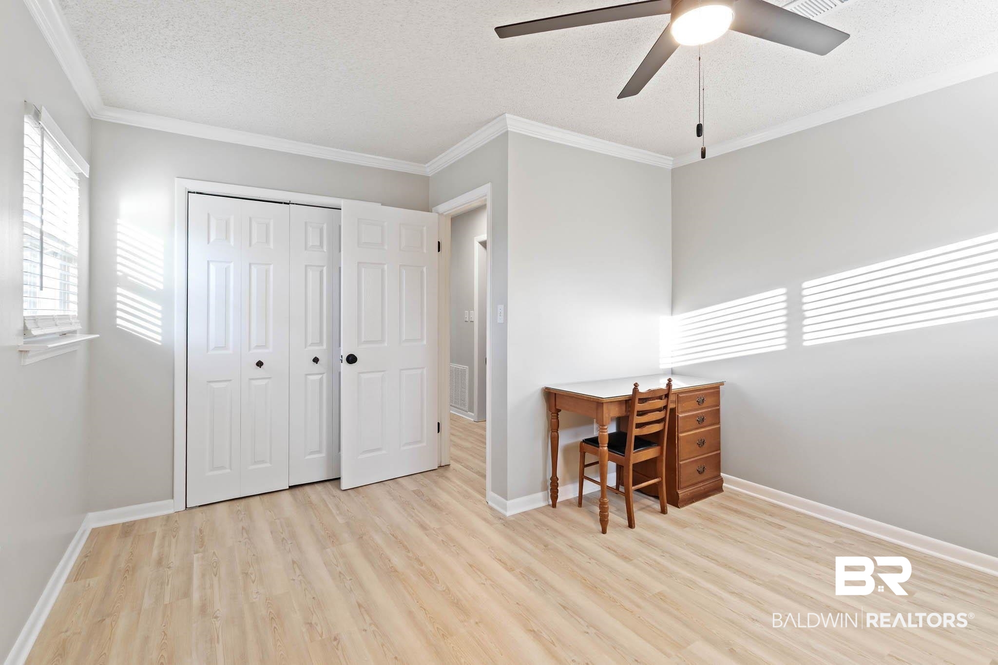 608 Southern Way Daphne, AL 36527 - Photo 26 of 35 Home office featuring a textured ceiling, crown molding, light wood finished floors, and ceiling fan