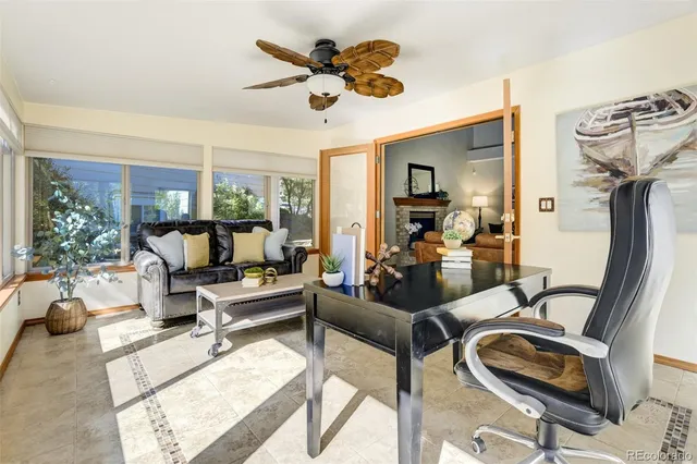 a bedroom with a bed and a mirror