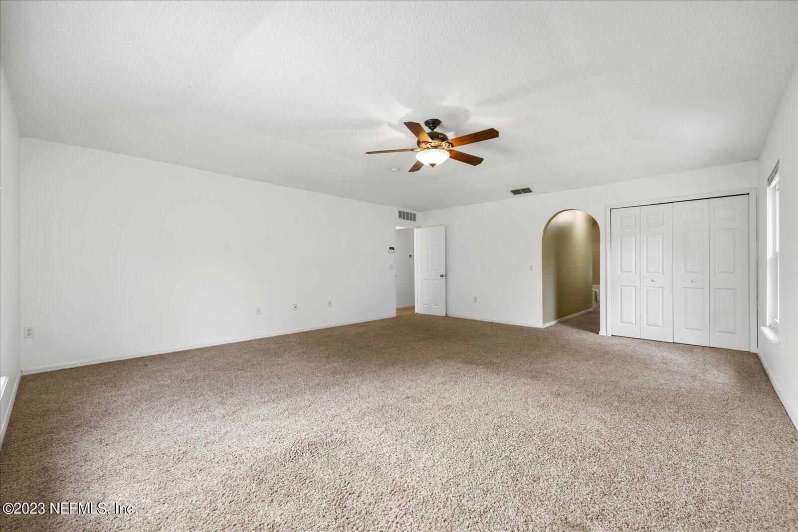 55703 Bear Run Road Callahan, FL 32011 - Photo 26 of 58 a view of a big room with carpet