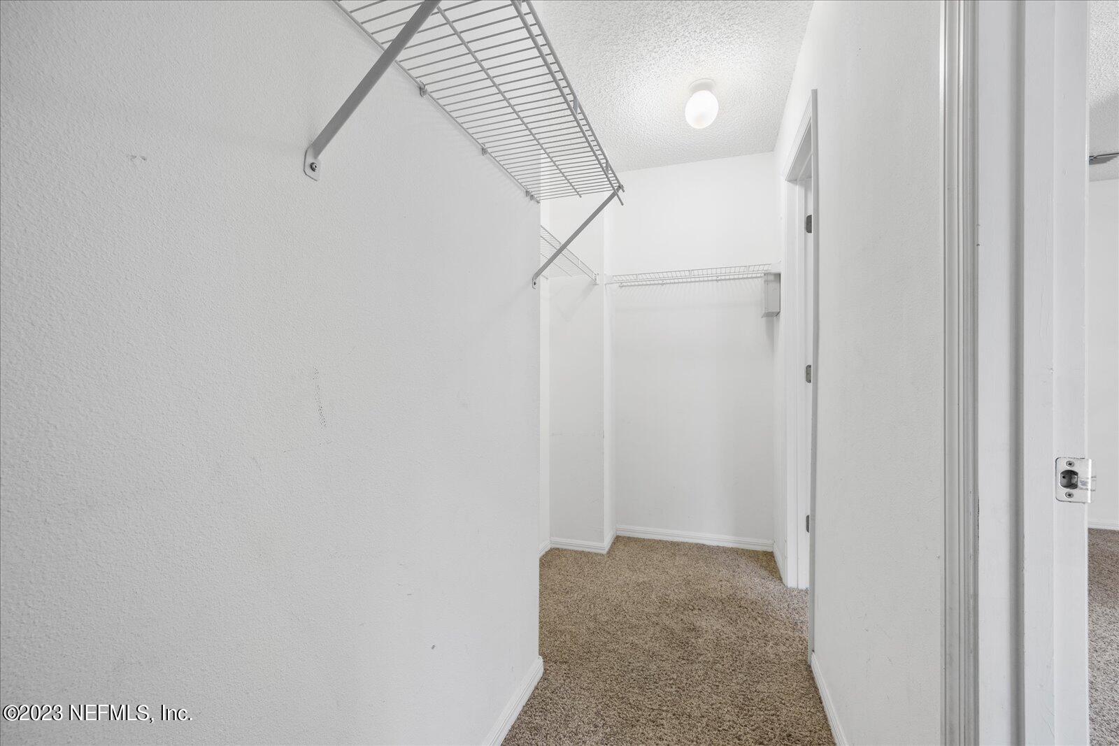 55703 Bear Run Road Callahan, FL 32011 - Photo 32 of 58 a view of hallway with shower