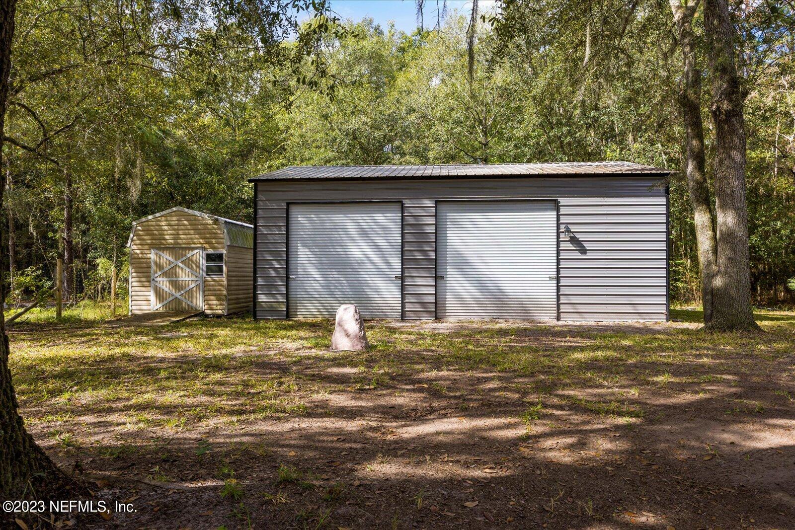 55703 Bear Run Road Callahan, FL 32011 - Photo 43 of 58 a backyard of a house