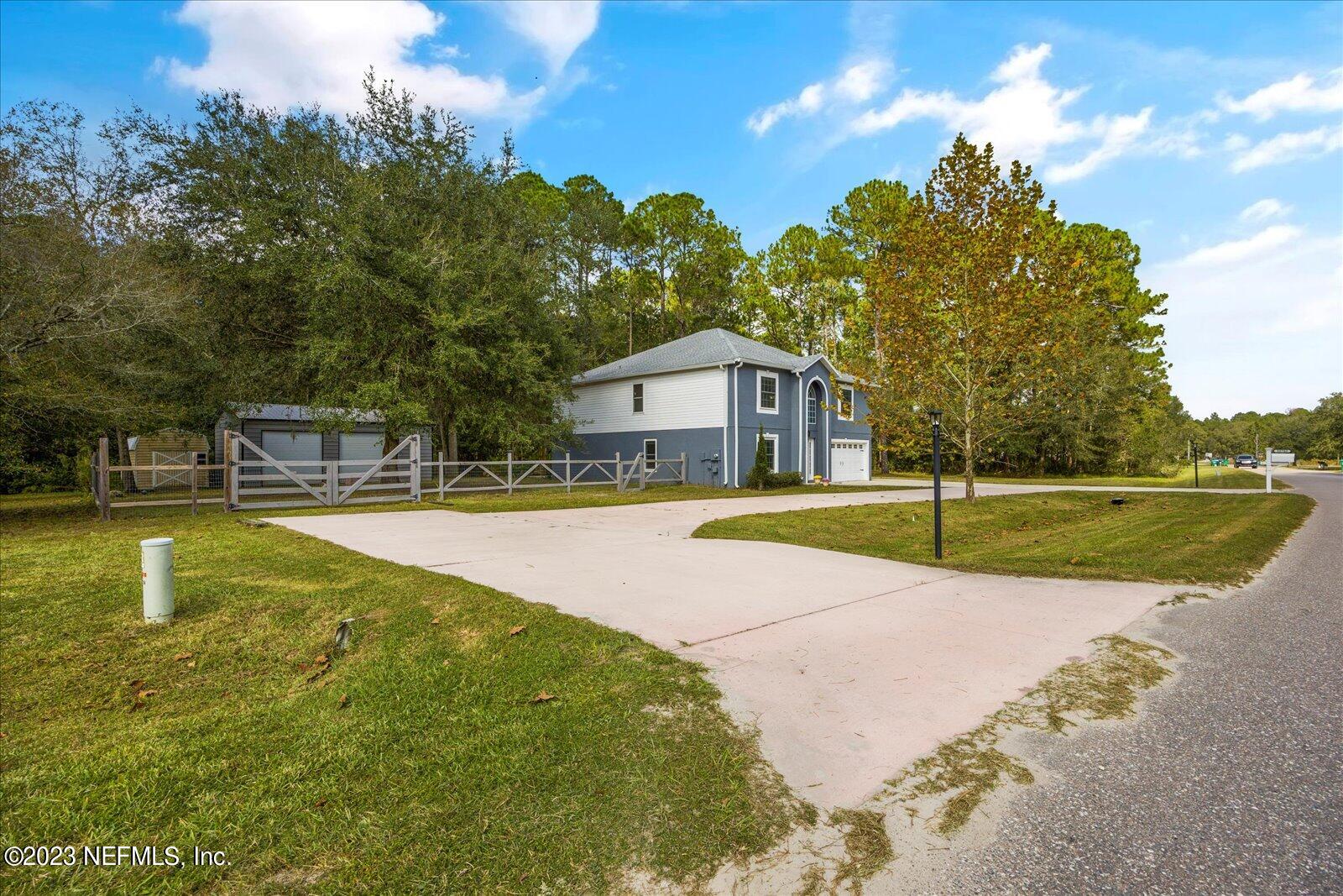 55703 Bear Run Road Callahan, FL 32011 - Photo 46 of 58 a view of a house with swimming pool