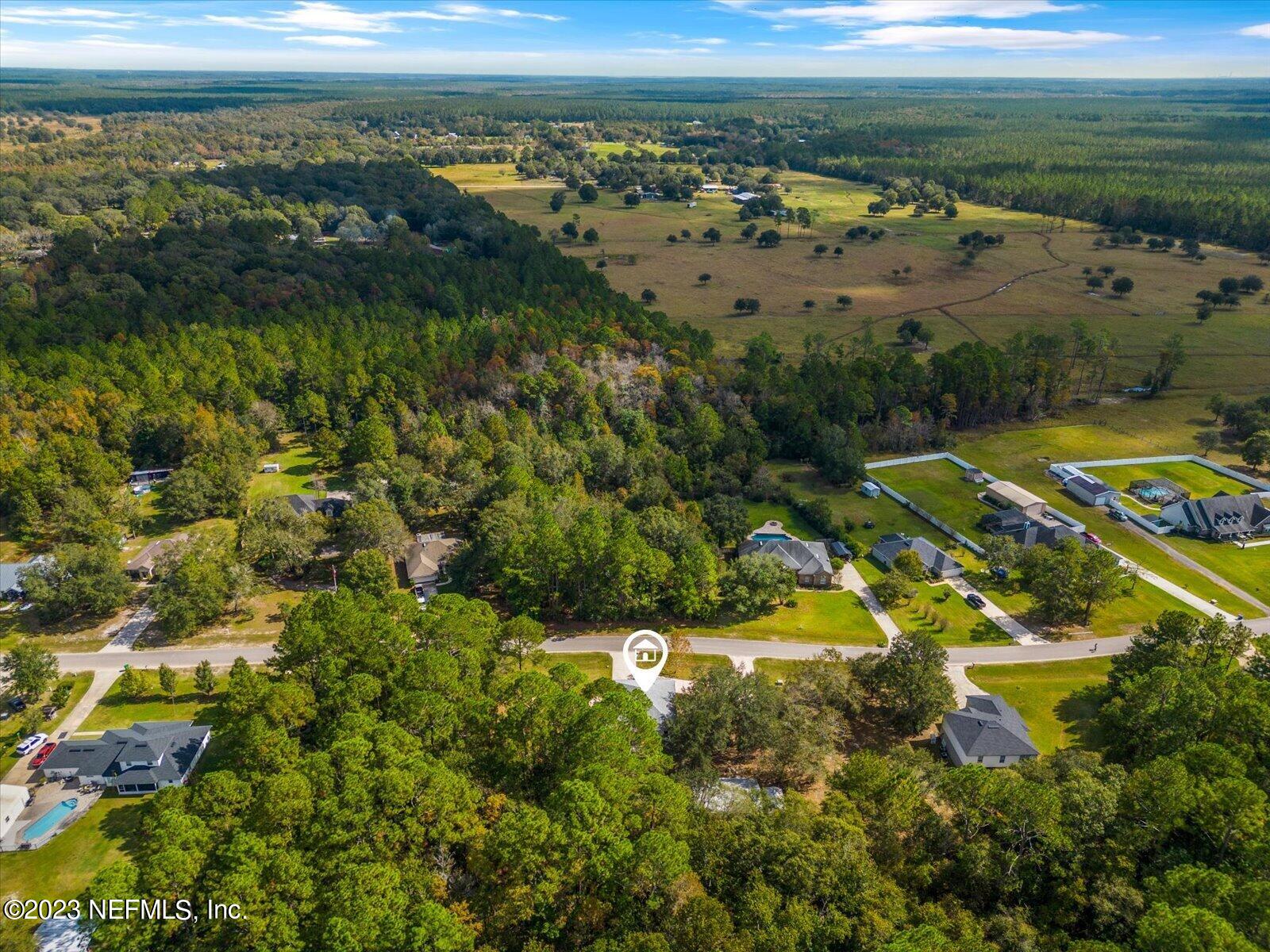 55703 Bear Run Road Callahan, FL 32011 - Photo 55 of 58 a view of a city with an ocean