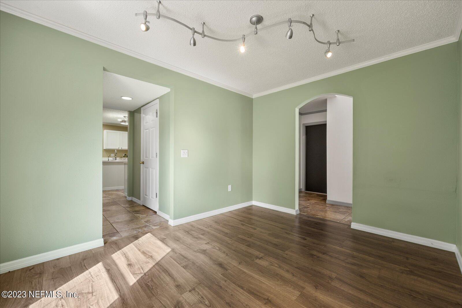 55703 Bear Run Road Callahan, FL 32011 - Photo 9 of 58 a view of an empty room with wooden floor
