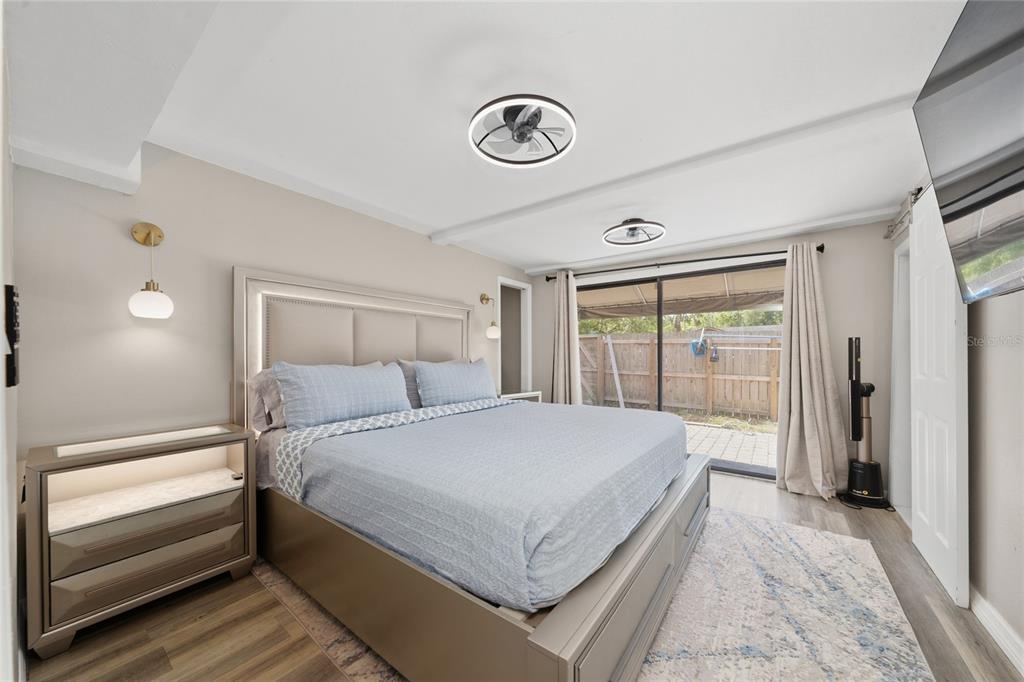 357 Ridgewood Street Altamonte Springs, FL 32701 - Photo 13 of 36 a bedroom with a bed and a window