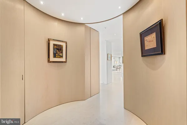 a view of a hallway with an entryway