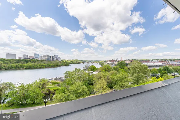a view of a lake from a balcony