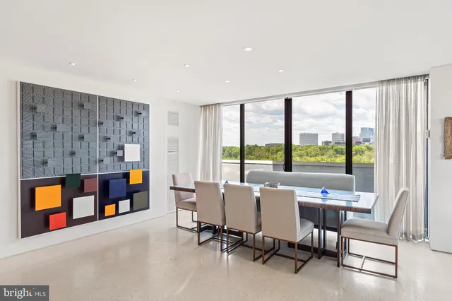 a view of a livingroom with furniture and window