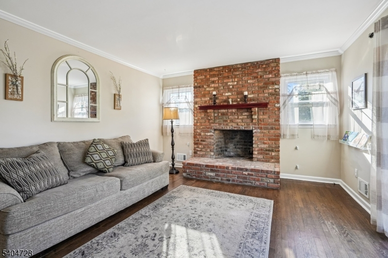 15 Southview Road Randolph, NJ 07869 - Photo 17 of 39 a living room with furniture window and a fireplace