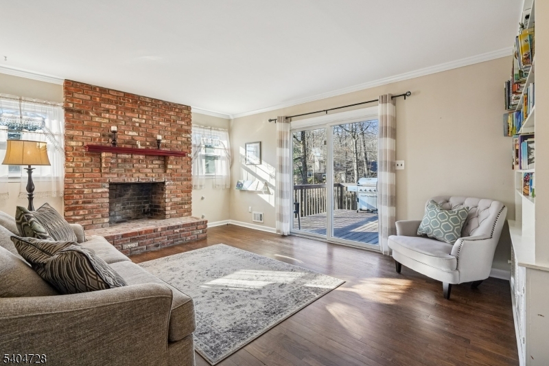 15 Southview Road Randolph, NJ 07869 - Photo 18 of 39 a living room with furniture and a fireplace