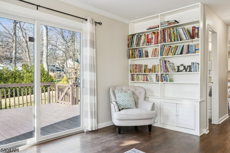 15 Southview Road Randolph, NJ 07869 - Photo 19 of 39 a living room with furniture a bookshelf and a window