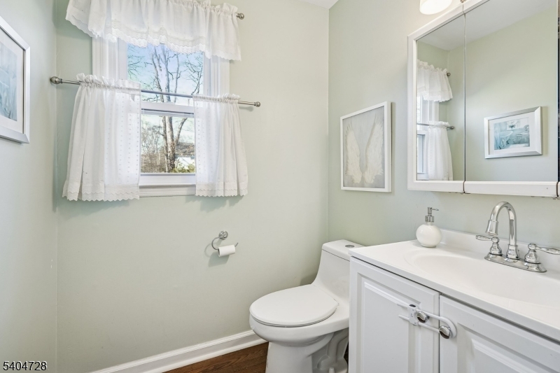 15 Southview Road Randolph, NJ 07869 - Photo 20 of 39 a bathroom with a sink a toilet and shower