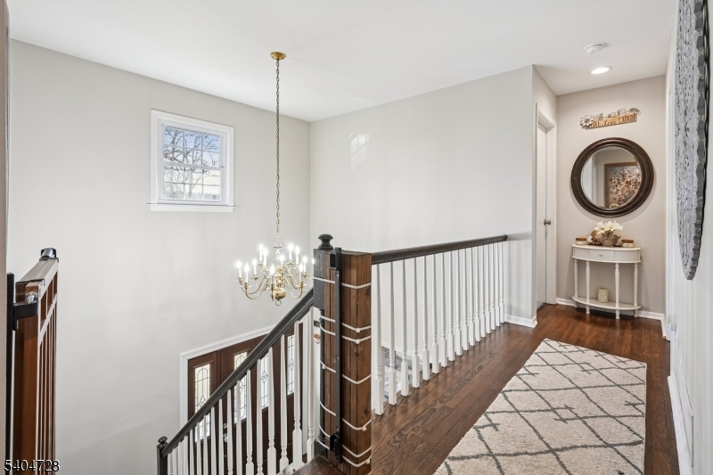 15 Southview Road Randolph, NJ 07869 - Photo 22 of 39 a view of a hallway with entryway wooden floor and front door
