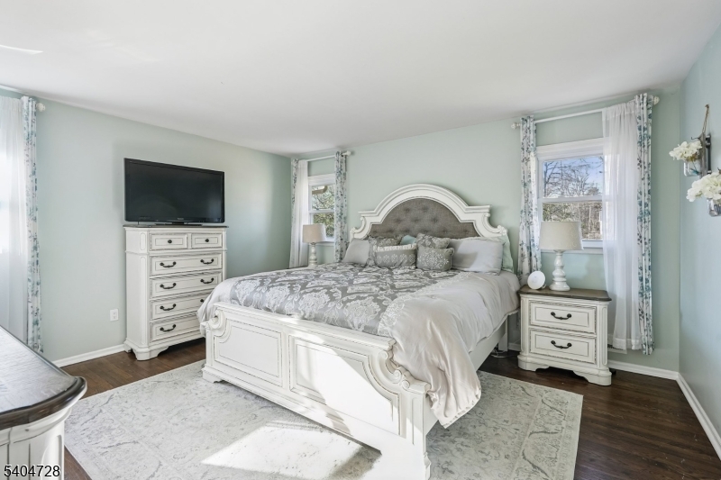 15 Southview Road Randolph, NJ 07869 - Photo 23 of 39 a bedroom with a bed and a flat screen tv